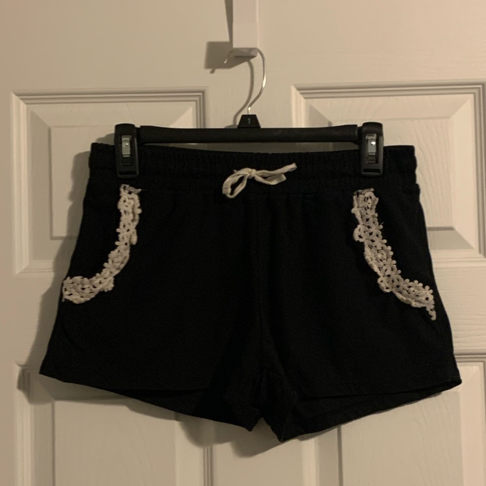 Black shorts with white lace